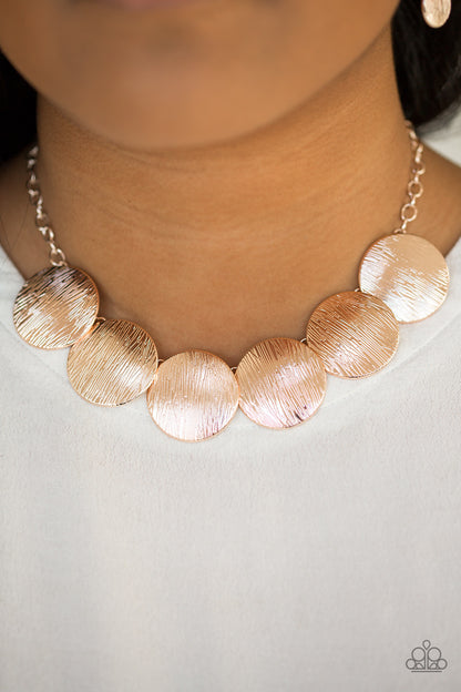 Glued To The SPOTLIGHT - Rose Gold Paparazzi Necklace