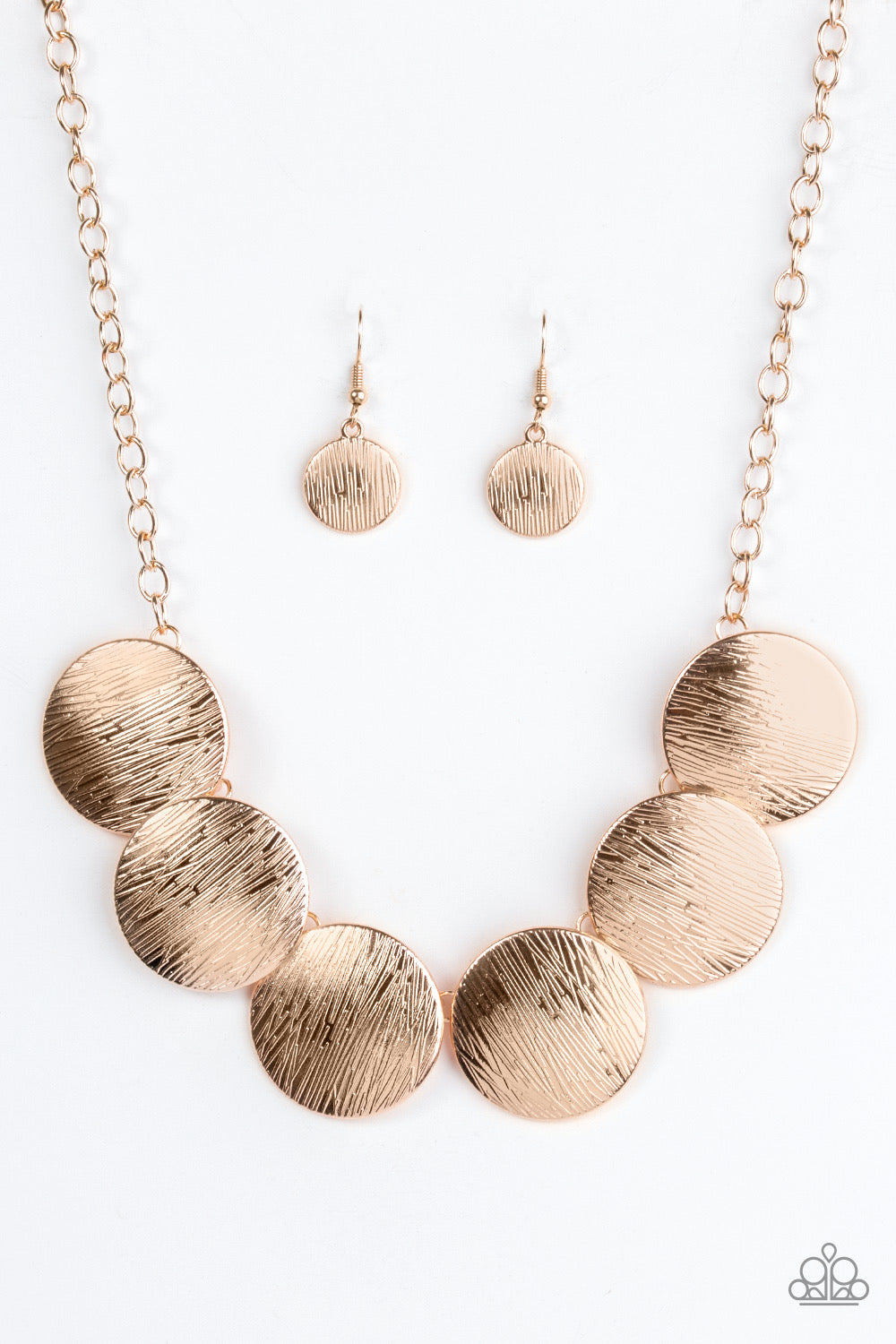 Glued To The SPOTLIGHT - Rose Gold Paparazzi Necklace